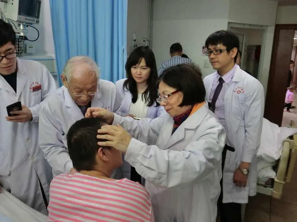 Dr. Shy and Dr. Sheng Chun Chang during Zhu’s Scalp Acupuncture (ZSA) clinical training at Qingdao Brain Hospital, China, 2013.